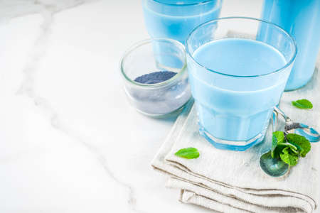 Plant based drink, blue matcha smoothie, vegan trendy beverage from the dried butterfly pea flowersの写真素材