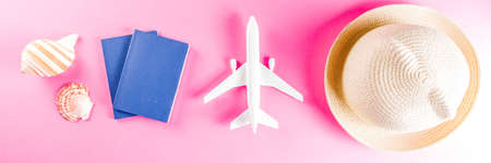 Travel and vacation flat lay concept. Summer bright colorful background with hat, sunglasses, plane,...