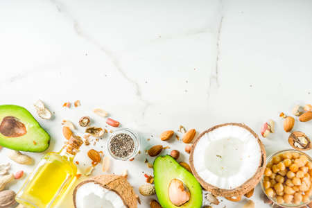 Healthy vegan fat food sources, omega3, omega6 ingredients - almond, pecan, hazelnuts, walnuts,...