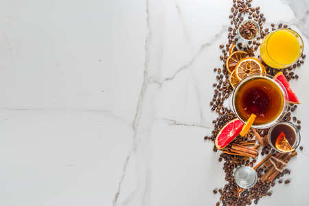 Negroni coffee cocktail with ingredients - coffee, orange, grapefruit, spices, liqueur, white marble background copy spaceの写真素材