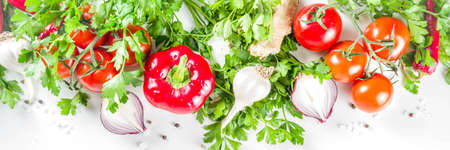 Cooking background with fresh vegetables and herbs. Healthy clean eating vegetarian food, diet...