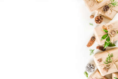 Collection of christmas gift boxes with natural rustic decorations. Organic vegan, no plastic concept, Zero waste life style.の写真素材