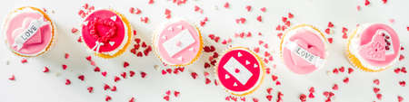 Valentine's day greeting card. Sweet Valentine's creative dessert food. Homemade pink and red ...