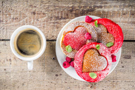 Valentine day brunch food recipe idea. Delicious homemade heart shaped red and white pancakes with...
