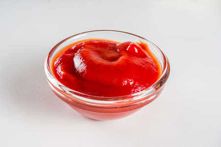 Set of sauces in small bowls - ketchup, mayonnaise, mustard, bbq sauce, pesto, classic burger sauce,...