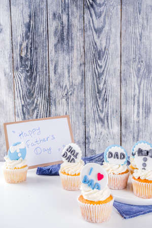 Happy Fatherâs Day greeting card.  Greetings and presents for Dad's day - gift box, coffee tea cup, tie, homemade special cupcakes. の写真素材
