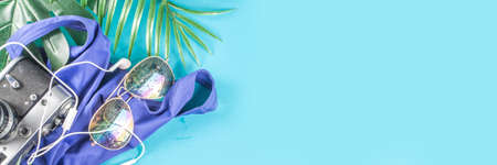 Summer vacation and travel concept. Beach accessories things - bag, hat, swimsuit, sunglasses,...