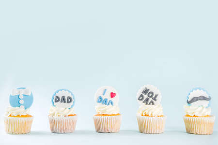 Happy Fatherâs Day greeting card.  Greetings and presents for Dad's day - gift box, coffee tea cup, tie, homemade special cupcakes. の写真素材