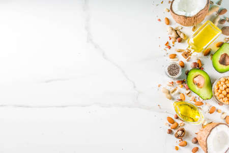 Healthy vegan fat food sources, omega3, omega6 ingredients - almond, pecan, hazelnuts, walnuts,...