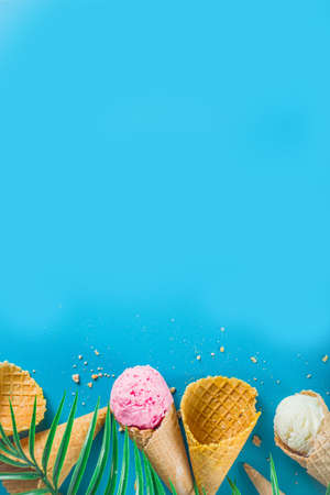 Set of various bright multicolored ice-cream in ice cream waffle cones - chocolate vanilla blueberry...