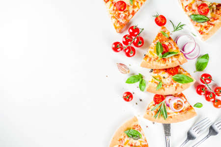 Pieces of cheese pizza Margarita, set like christmas tree. White stone background top view....