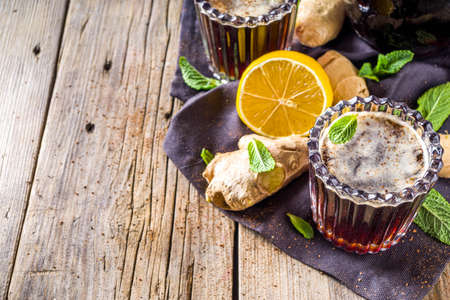 Indian summer refreshment beverage, Panakam Or Gur (Jaggery) Sharbat, Panakaam drink, Traditional sarbats, infusions of fruits, flowers, herbs, roots, rustic wooden background copy spaceの写真素材