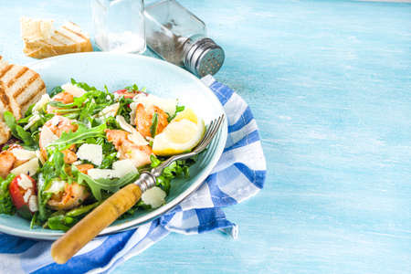 Healthy food concept, Diet salad plate. Fresh seafood salad recipe. Grilled shrimp prawns, fresh vegetable salad and egg. の写真素材