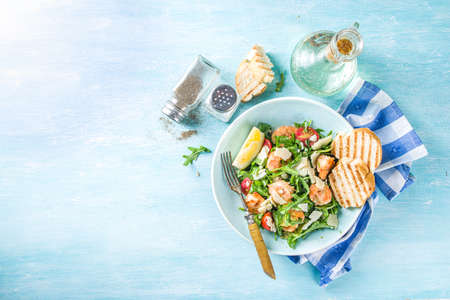 Healthy food concept, Diet salad plate. Fresh seafood salad recipe. Grilled shrimp prawns, fresh vegetable salad and egg. の写真素材