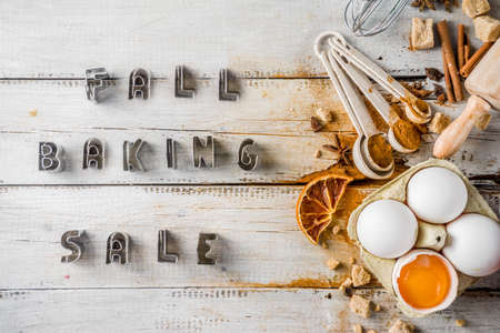 Autumn baking sale concept. Cooking seasonal fall baking background with ingredients, spices,...