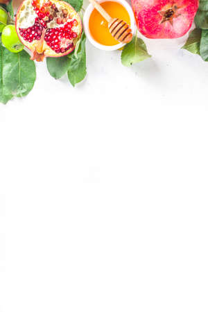 Rosh hashanah, jewish New Year holiday concept, banner. With traditional symbols, apples, pomegranate, honey. Rosh hashanah greeting card background.の写真素材