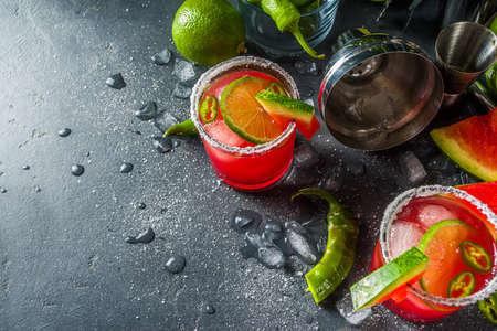 Watermelon jalapeno margarita. Alcoholic mexico style summer cocktail with watermelon, hot chili jalapeno, lime and tequila.の写真素材