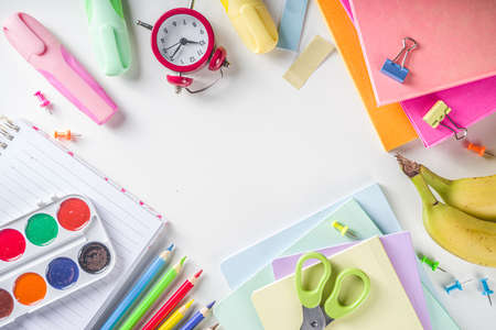 Back to school concept. Flatlay on white background with various school office supplies and stationery, top view copy spaceの写真素材