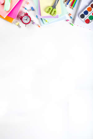 Back to school concept. Flatlay on white background with various school office supplies and stationery, top view copy spaceの写真素材