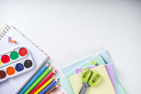 Back to school concept. Flatlay on white background with various school office supplies and stationery, top view copy spaceの写真素材
