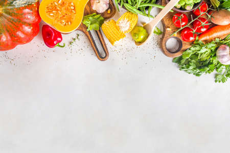Autumn cooking background. Organic autumn harvest vegetables, raw vegan ingredients for cooking...
