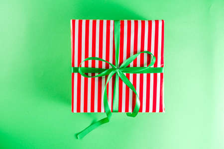 Christmas gift boxes simple pattern background. Festive boxes with Christmas presents, decorated...