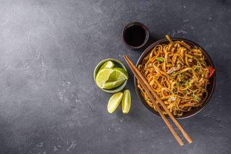 Asian vegetarian pasta, Homemade udon noodles with stir fry shiitake mushrooms, sesame and...