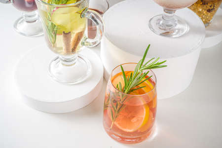 Various autumn winter alcohol drinks set. Different seasonal alcohol cocktails - mulled wine, glogg,...