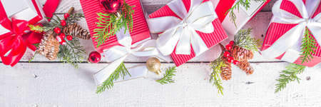 Merry Christmas and Happy New Year. Noel greeting card background. Christmas gift boxes with festive...