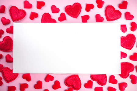 Valentine's day greeting card background, frame with hearts on tender pink background