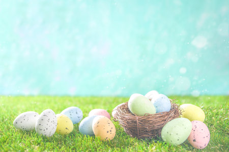 Happy Easter background, spring-time concept. Colorful pastel eggs, nests and bunny toys on sunny...