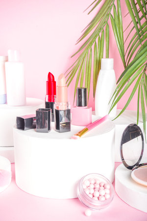 Creative background with decorative cosmetic. Beauty and body care product concept on trendy stands or podiums. Stands mockup with make up products copy spaceの写真素材