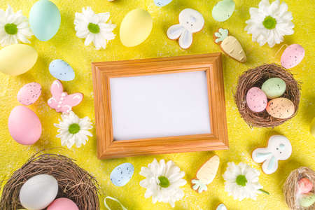 Easter poster background with Easter eggs in nests on yellow background. Greetings card, presents...