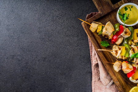 Homemade chicken meat skewers with vegetables, top view copy spaceの写真素材