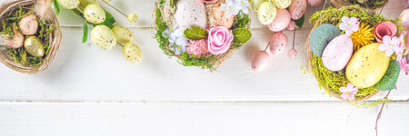 Happy easter background with Nests decoration, colorful eggs and Spring Flowers. Caster card on...