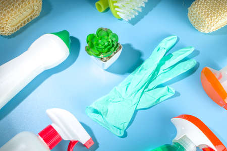 Spring cleaning creative background. Spring cleaning tools, utensils, accessories background,...