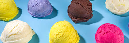 Colorful various ice cream scoops pattern on pastel blue background. Summer minimalism pattern flat...