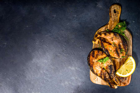 Grilled salmon steaks with spices and lemon, bbq keto diet fod conceptの写真素材
