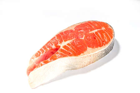 Two raw big salmon trout steaks, slice of fresh raw fish ready for cooking isolated on white...