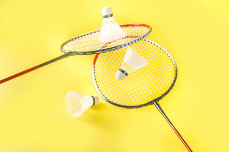 Summer sport activity concept. Two badminton paddle rackets with shuttlecocksの写真素材
