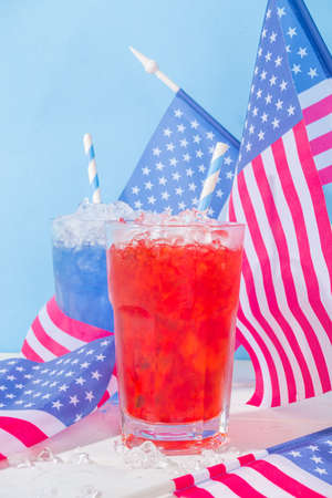 Drinks for American Independence Day celebration. USA flag colored red and blue iced cocktails copy spaceの写真素材