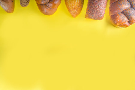 Assortment of various delicious freshly baked breadの写真素材