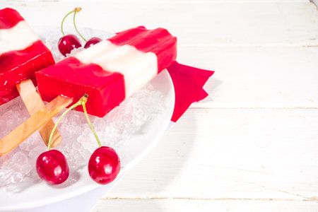 Patriotic Red White Ice cream  for Canada Day, on white wooden table. Copy space top viewの写真素材
