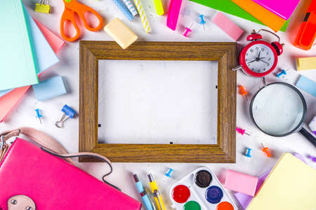Back to school, education background. Back to School White Background with School Bag Backpack, Notebook, Pen, Pencil, Pencils, Magnifying Glass, Eraser, Paper Clip, Alarm Clock, School Suppliesの写真素材