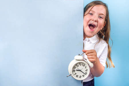 Back to school, invitation, advertisement banner. Cute primary school student girl in white blue...