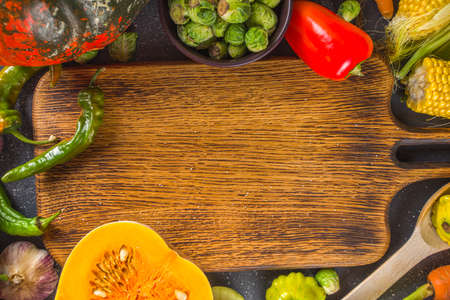 Autumn cooking background. Organic autumn harvest vegetables, raw vegan ingredients for cooking...