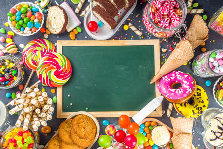 Selection of colorful sweets. Set of various candies, chocolates, donuts, cookies, lollipops, ice...