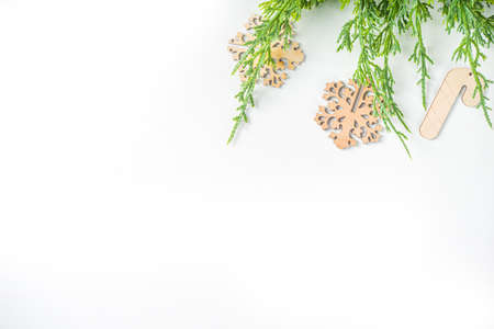 Christmas new year background with handmade wooden eco fir tree decorations, top viewの写真素材