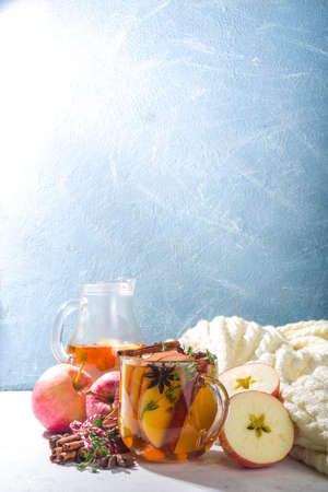 Autumn hot cider cocktail, apple tea with cinnamon and thyme, on white background copy space top viewの写真素材