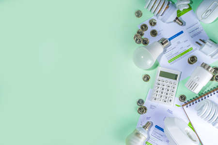 Energy saving with modern modernization technology and devices. Electricity bills, LED bulbs, heat...